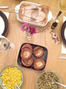 Food on a table set for Thanksgiving