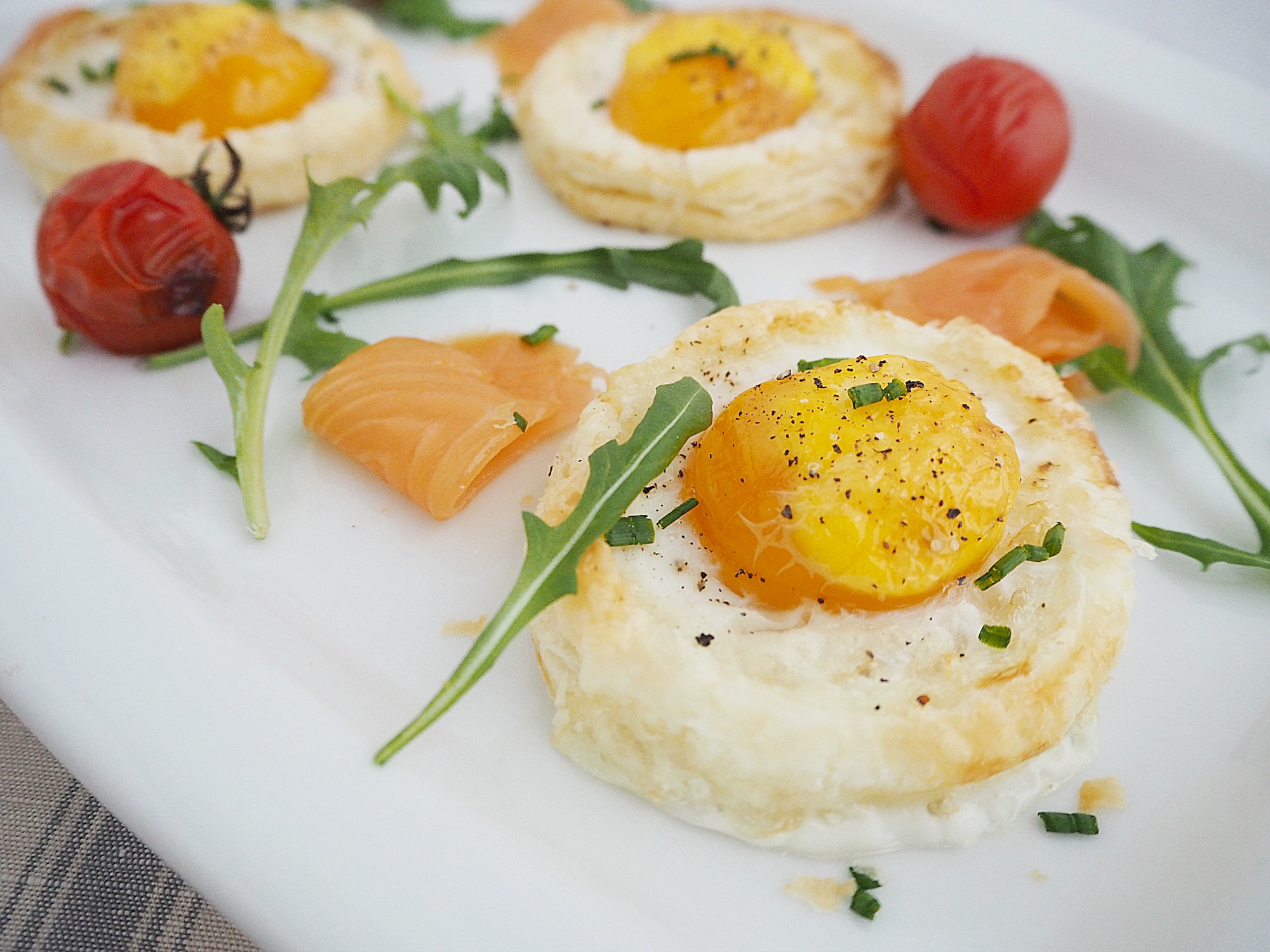 3 baked eggs in pastry, smoked salmon, rocket and roasted cherry tomatoes