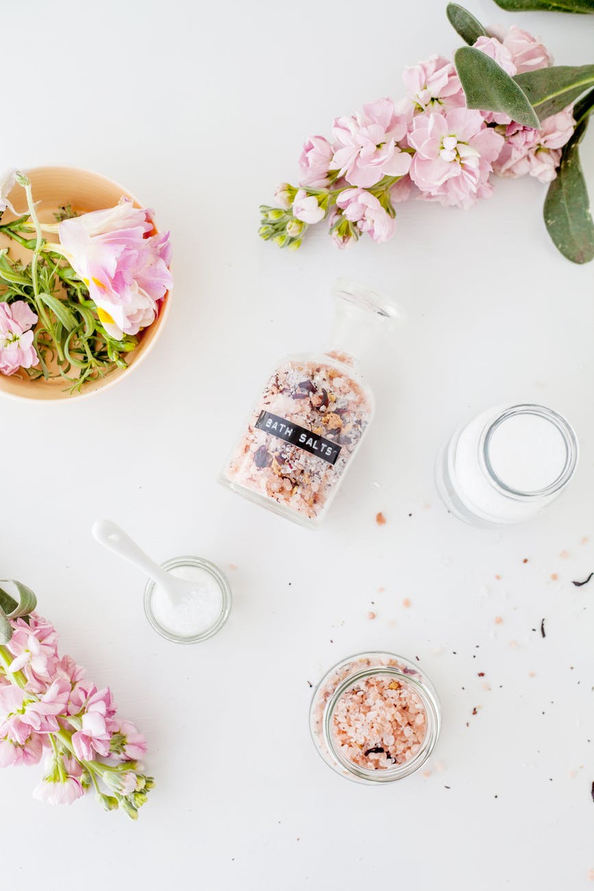 set of jars of bath salts composed with gentle matthiola incana flowers